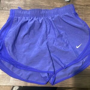 Like new purple Nike running shorts with liner size small